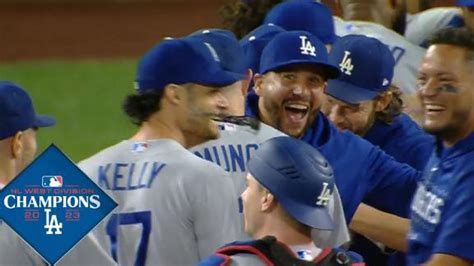 Dodgers clinch NL West title with 6-2 win over Mariners for 10th time in 11 years